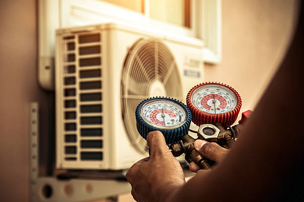 Professional Air Conditioning Service technician working in Morrison, CO